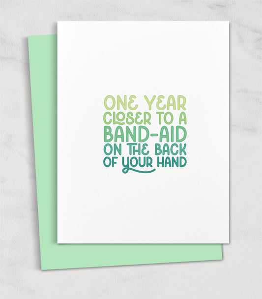 one year closer to a band aid on the back of your hand / birthday card for friend