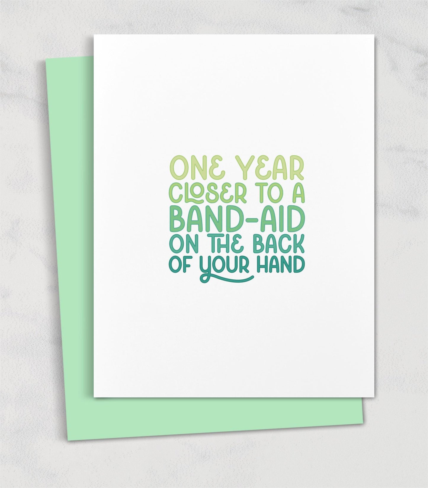 one year closer to a band aid on the back of your hand / birthday card for friend
